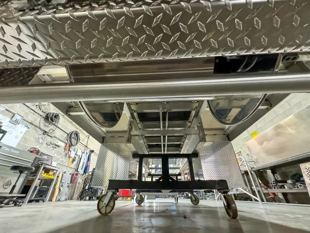 Cab interior upfit with exposed console area, photo 166 of 303.